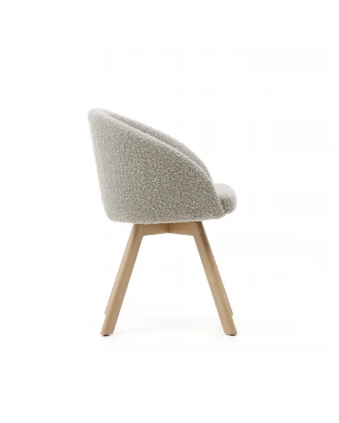 Marvin swivel chair with grey fleece and beech wood legs in a natural finish