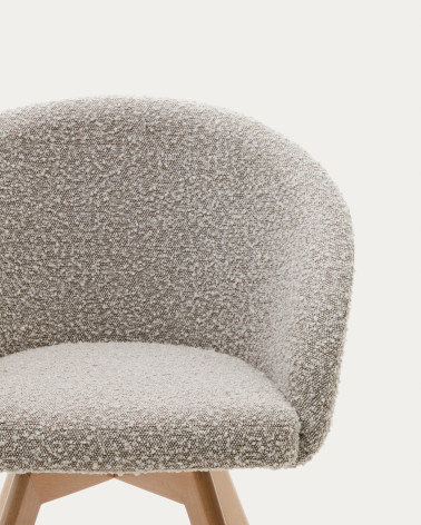 Marvin swivel chair with grey fleece and beech wood legs in a natural finish