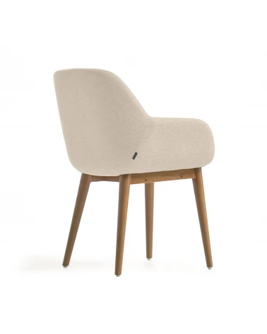 Konna chair in beige with solid ash wood legs in a dark finish