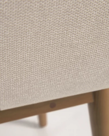 Konna chair in beige with solid ash wood legs in a dark finish