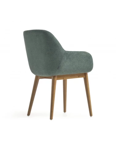 Konna chair in green with solid ash wood legs in a dark finish