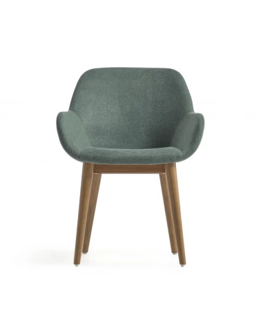 Konna chair in green with solid ash wood legs in a dark finish