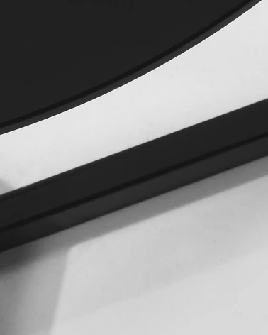 Black Raeam side table made with tempered glass and steel in black finish Ă 50 cm